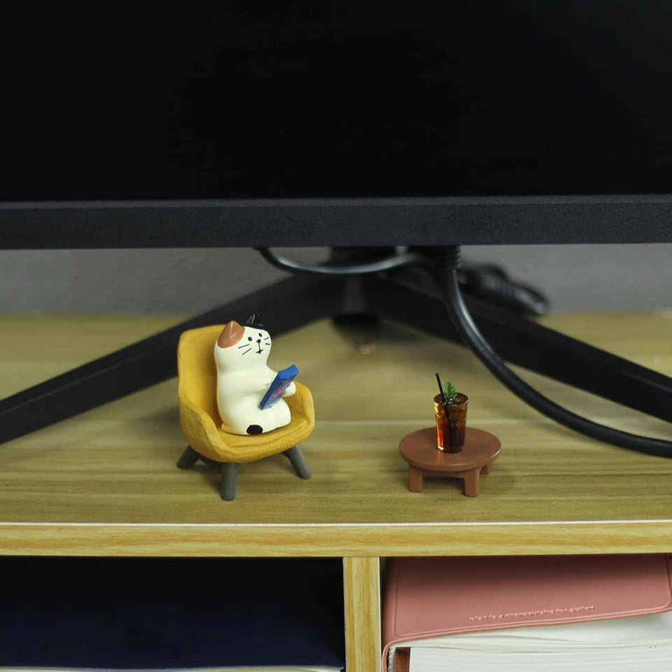 Cute cat figurine playing phone on sofa with coffee, cat lovers gift for home decor