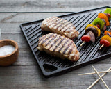 Lodge Reversible Cast Iron Grill/Griddle, 9.5 x 16.75 Inch Pre-Seasoned, Stove, Grill, or Campfire Use, Heavy-Duty, Black, Made in USA