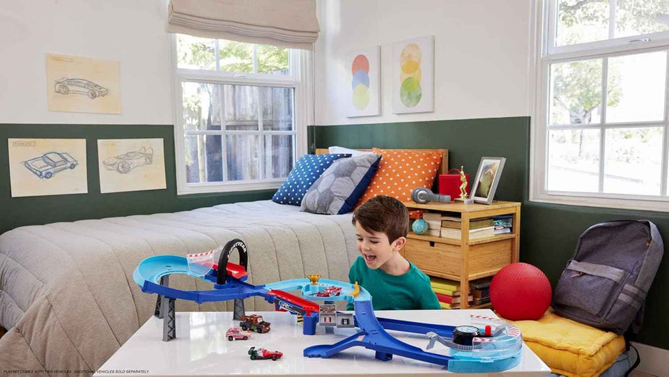 Mattel Disney Pixar Cars GRC Jumping Raceway track set with 2 cars, Lightning McQueen & Francesco Bernoulli, kid-powered booster