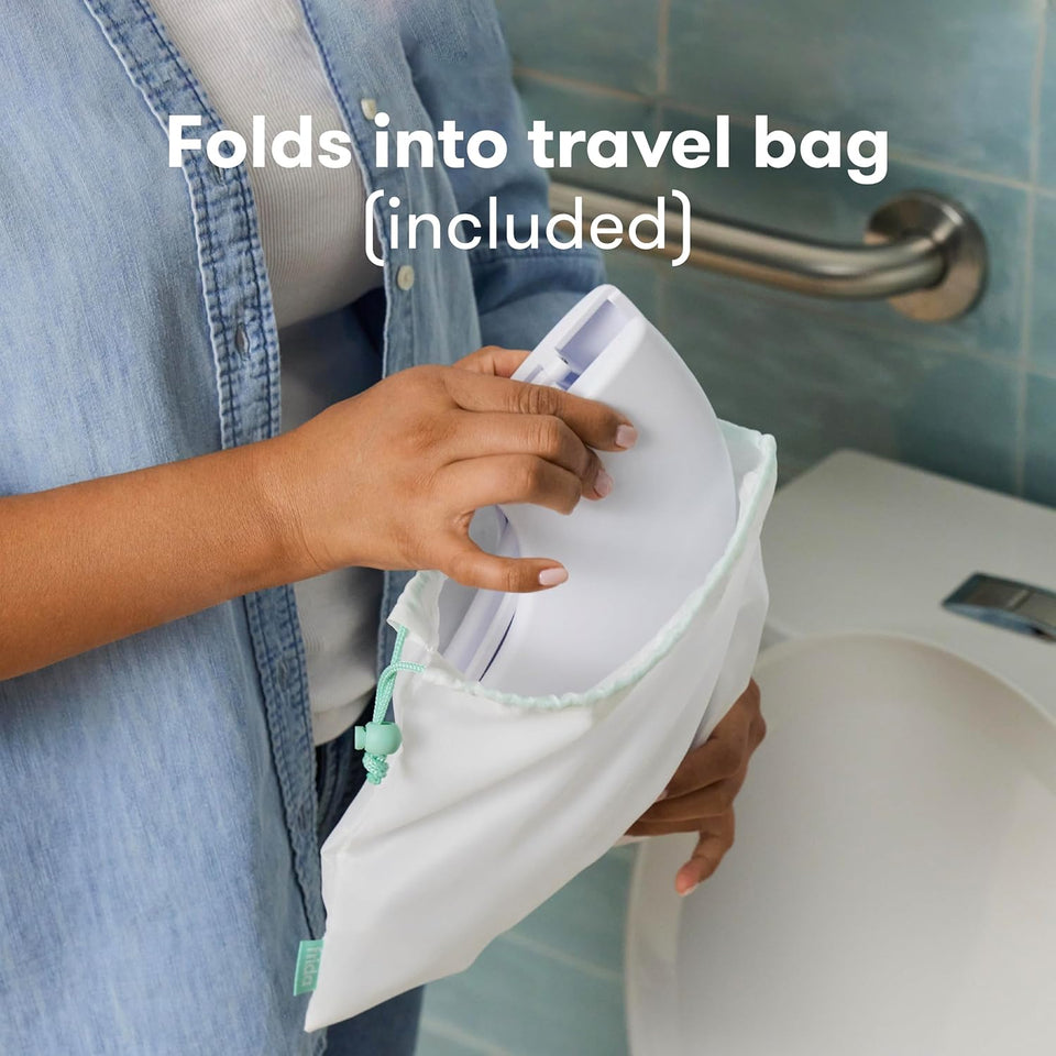Frida Baby Fold-and-Go Portable Potty Seat for Toilet, Foldable Travel Potty Seat for Toddler, Fits Round & Oval Toilets, Non-Slip Base, Handles, Includes Free Travel Bag