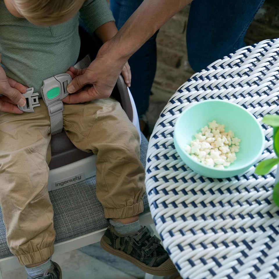 Ingenuity SmartClean Toddler Booster Seat for Kitchen Chair – Lightweight for on-the-go, Easy-Clean, 3-Point Harness Strap – Booster Seat for Dining Table, Slate